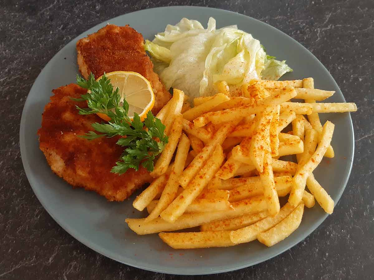 Putenschnitzel paniert